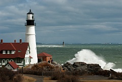 Waves Crash By Maine Lighthouses as Sun Breaks Through Clouds